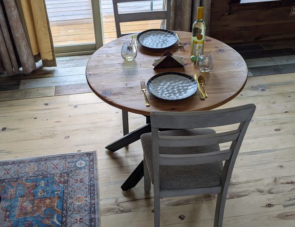 DINING AREA: Have a seat at the dining table, made by your host of local Western cedar.