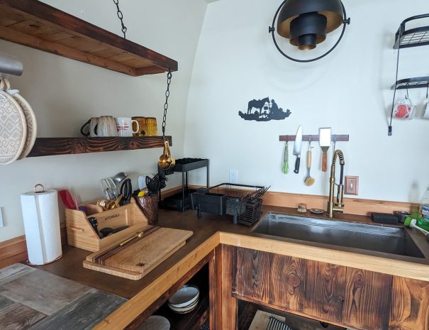 FULL KITCHEN: You can wash vegetables and later dishes in the farmhouse sink.