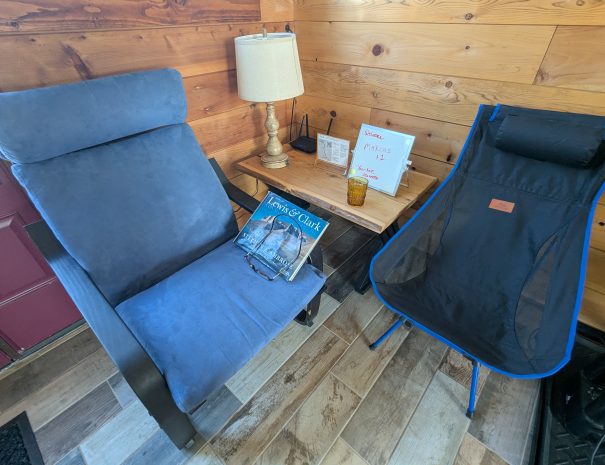 LIVING ROOM: Bring a good book (or get one from our little library)  or your laptop and a project to the reading  just inside the door. You'll find the comfortable Ikea Poang chair irresistable.