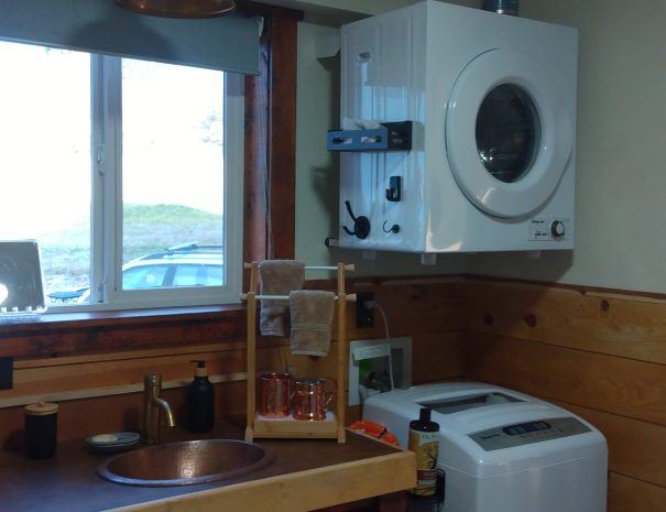 LAUNDRY: If it's laundry day for you, check out the tiny house washer and dryer. The dryer takes 200 minutes to dry (allow time!) and is best used in the middle of the day, if we are in summer and running off-grid.
