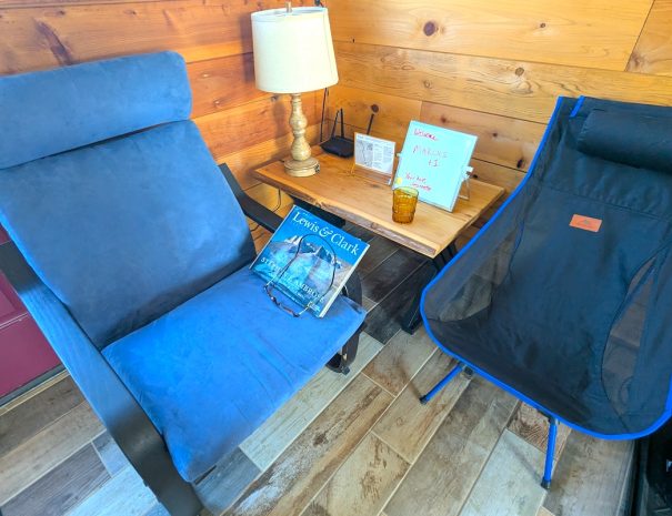 LIVING ROOM: Bring a good book (or get one from our little library)  or your laptop and a project to the reading  just inside the door. You'll find the comfortable Ikea Poang chair irresistable.