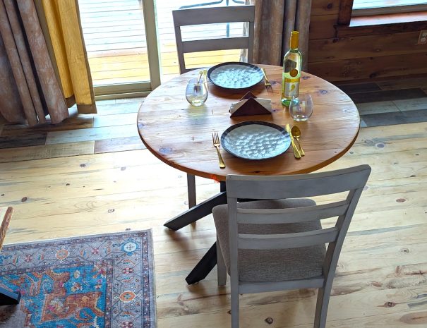 DINING AREA: Have a seat at the dining table, made by your host of local Western cedar.