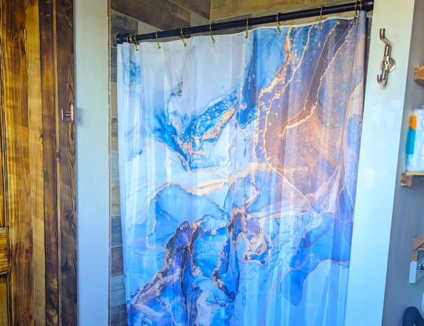 FULL BATHROOM: Enjoy hot water on demand in the walk-in shower. Give it half a minute to warm up!